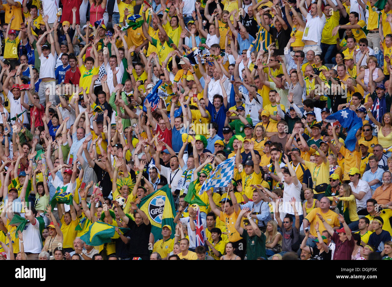 Brazilian soccer fans doing the wave at the World Cup 2006 in Germany Stock Photo