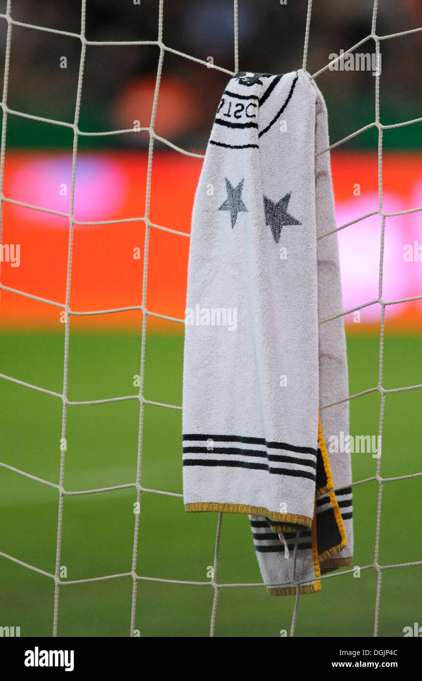 Towel of the goalkeeper of the German national football team hanging on the net of the goal Stock Photo