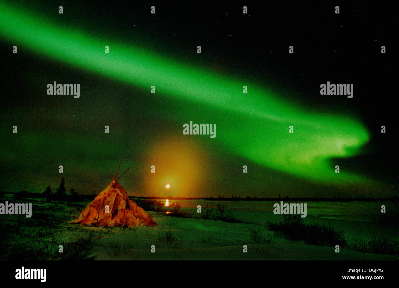 Aurora Borealis Northern Lights full moon over wigwam caribou skin