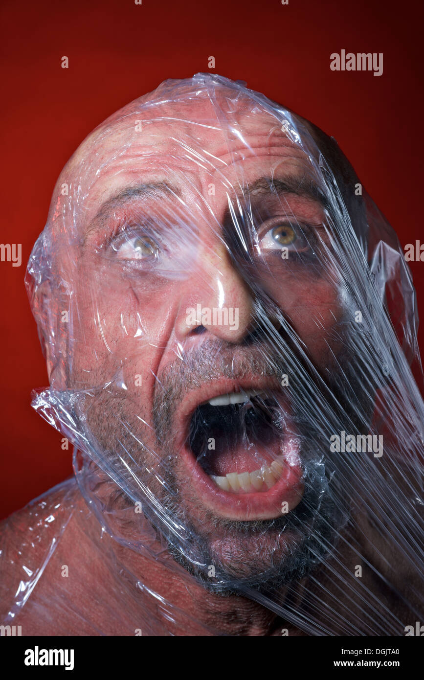 Hamburg, Germany, portrait of a man whose head is wrapped in foil Stock Photo