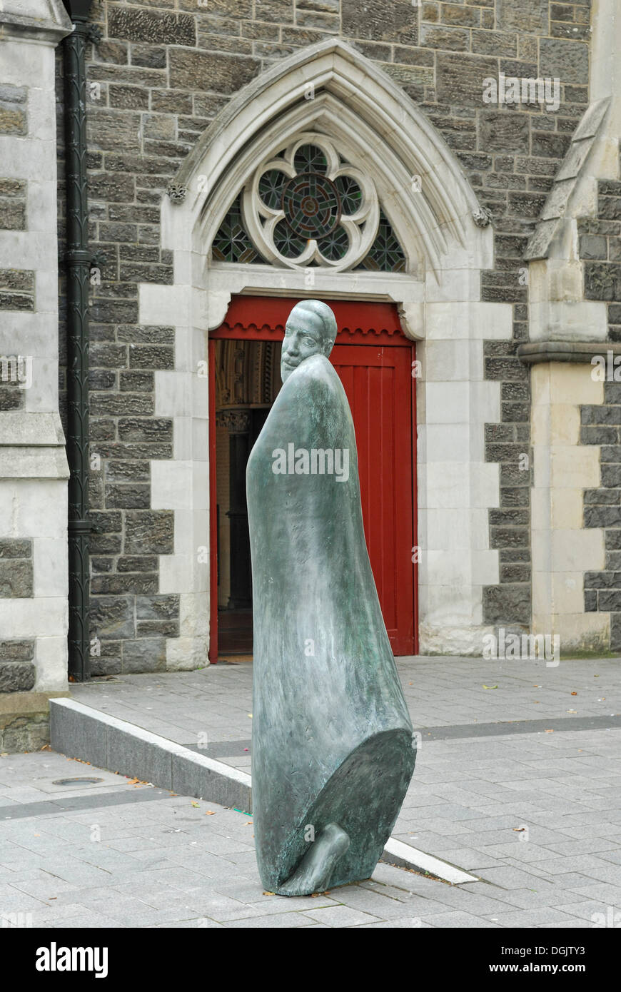 Bronze statue of a monk outside Christchurch Cathedral, Cathedral Square, Christchurch, South Island, New Zealand Stock Photo