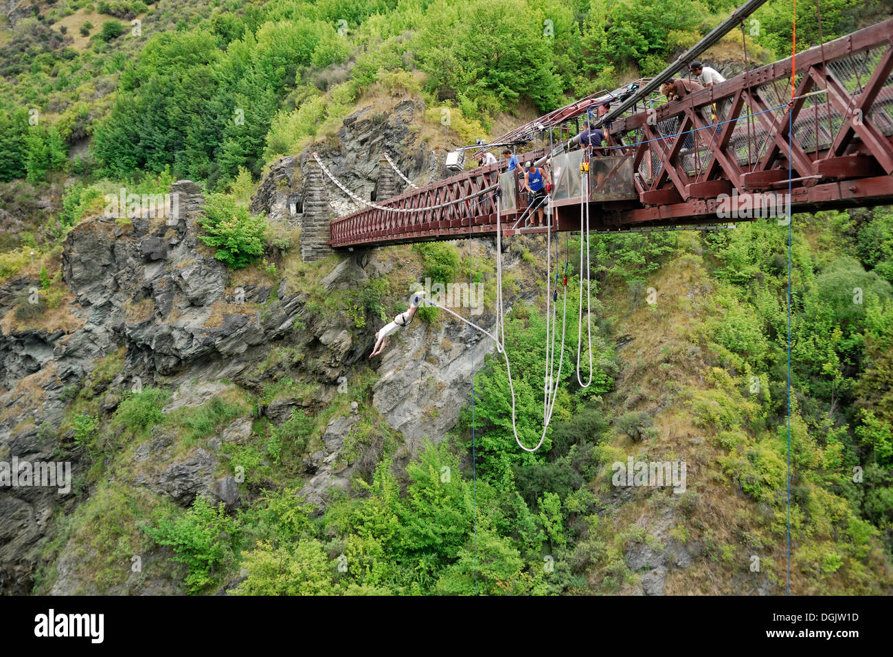 Bungee jumping on the historic suspension bridge across the Kawarau River, Arrowtown, South Island, New Zealand Stock Photo