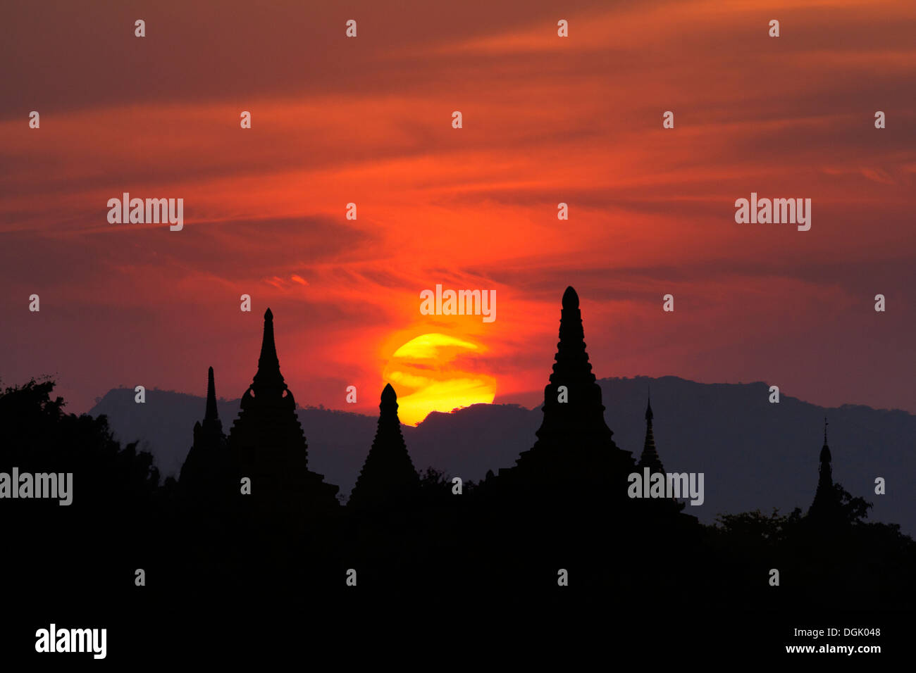 Sunset over the stupas and pagodas of Bagan in Myanmar. Stock Photo