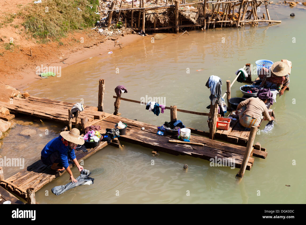 Washday by the river at Inn Thein Village in Myanmar. Stock Photo