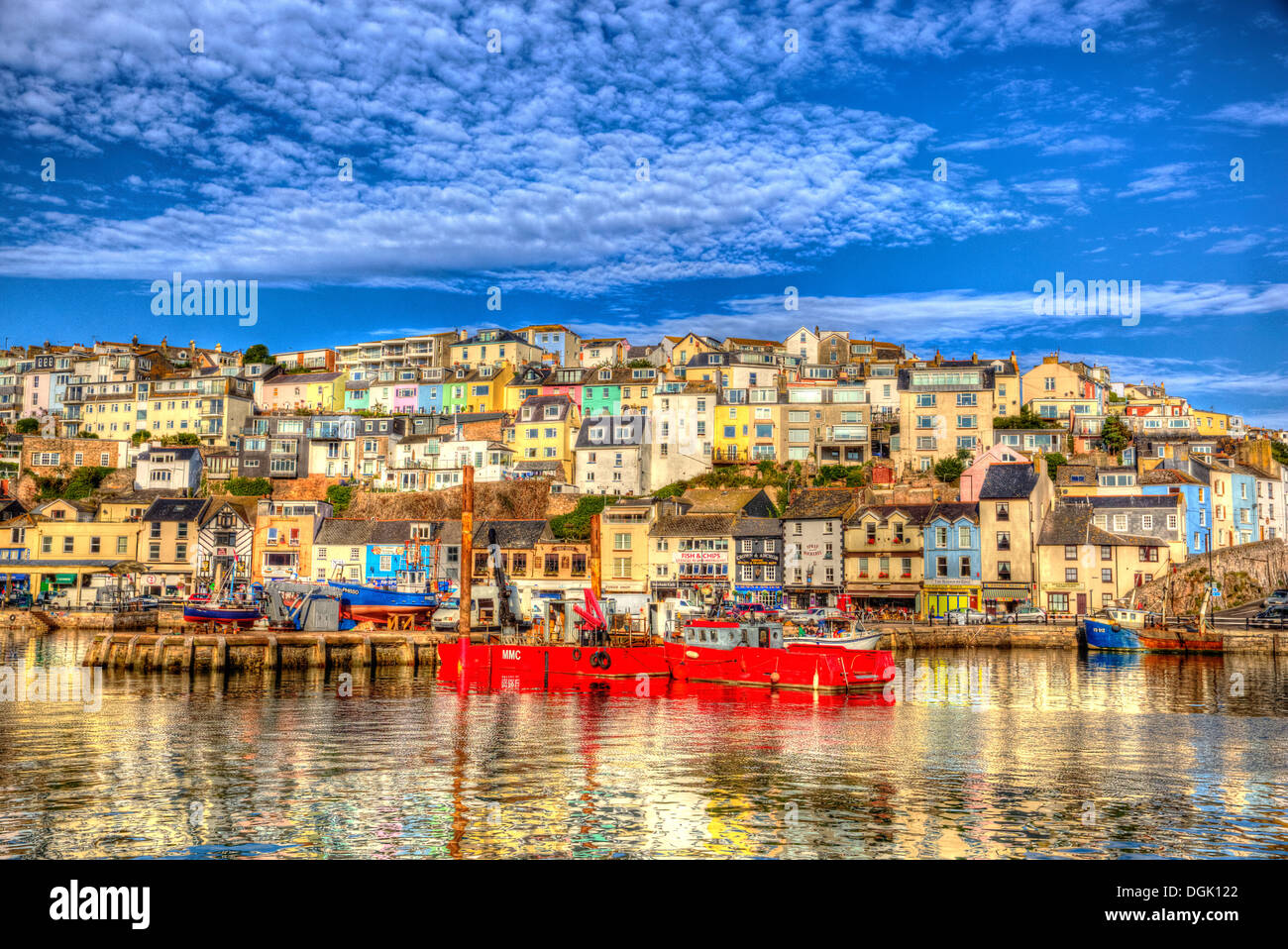Brixham harbour Devon England UK English fishing scene with boats and blue sea and sky in HDR Stock Photo