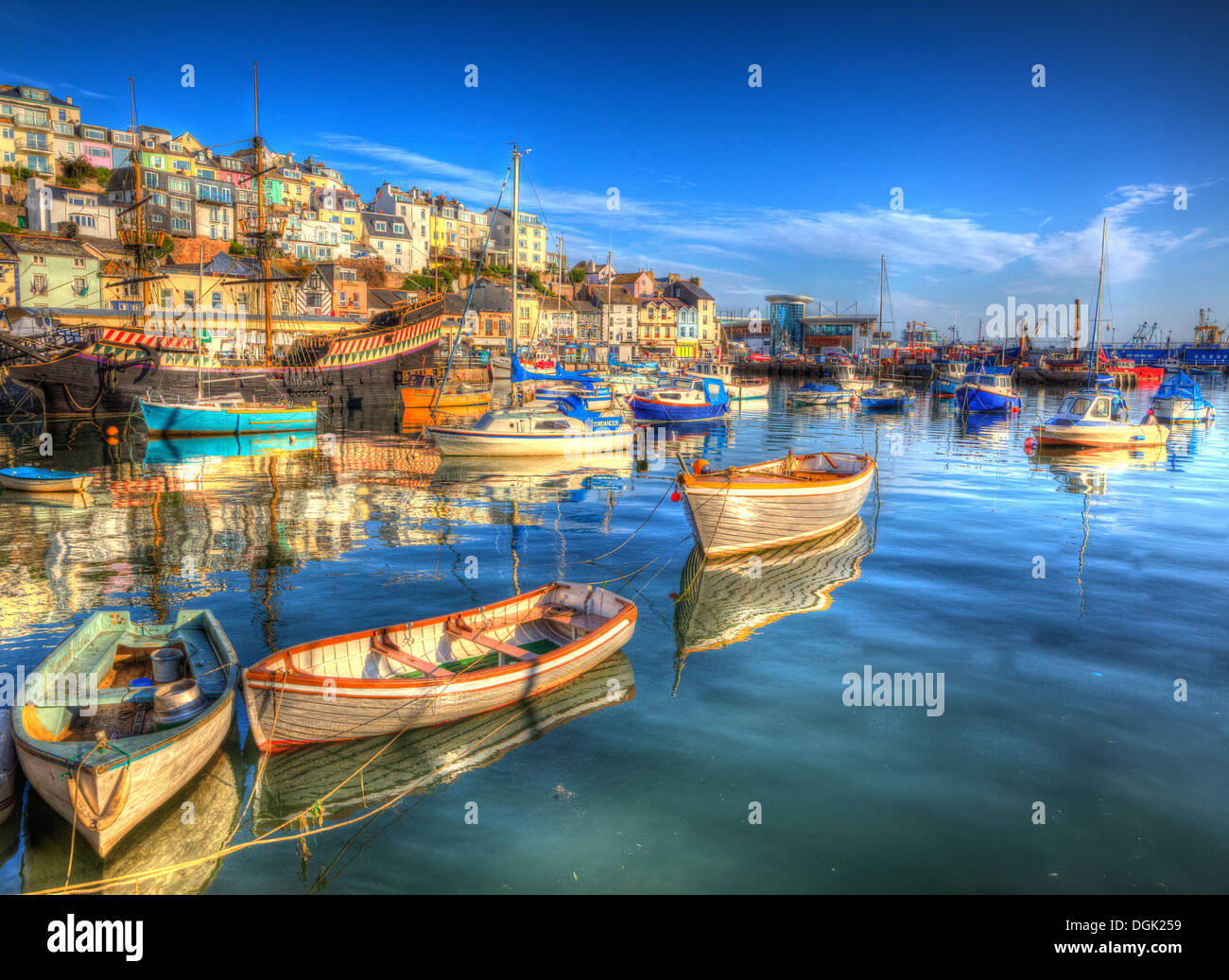 Brixham harbour Devon England UK English fishing scene with boats and blue sea and sky in HDR Stock Photo