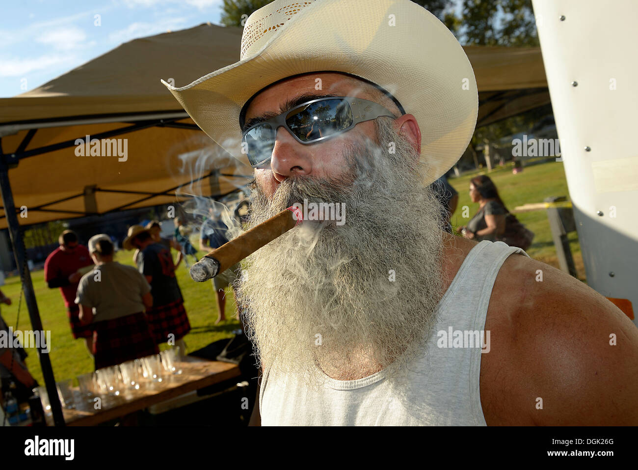 cigar smoking cowboy at dixon highland games Stock Photo