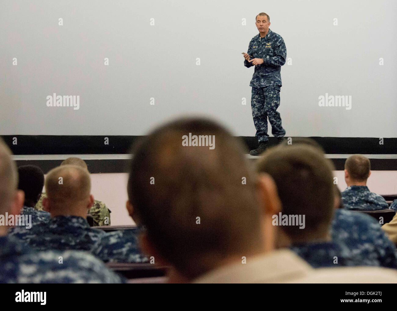 NAVAL AIR FACILITY ATSUGI, Japan (Oct. 9, 2013) – Commander, U.S. Naval Forces Japan (CNFJ) Rear Adm. Terry Kraft addresses Sailors during an all hands call at Naval Air Facility Atsugi’s Cinema 77. During his visit, Kraft discussed the importance of the Stock Photo