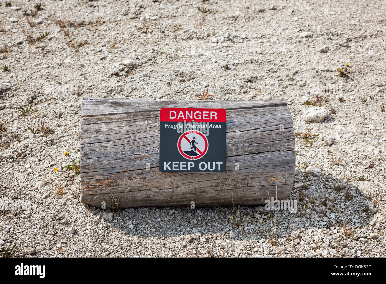 Warning sign telling of geothermal danger in West Thumb Geyser Basin, Yellowstone National Park, Wyoming Stock Photo