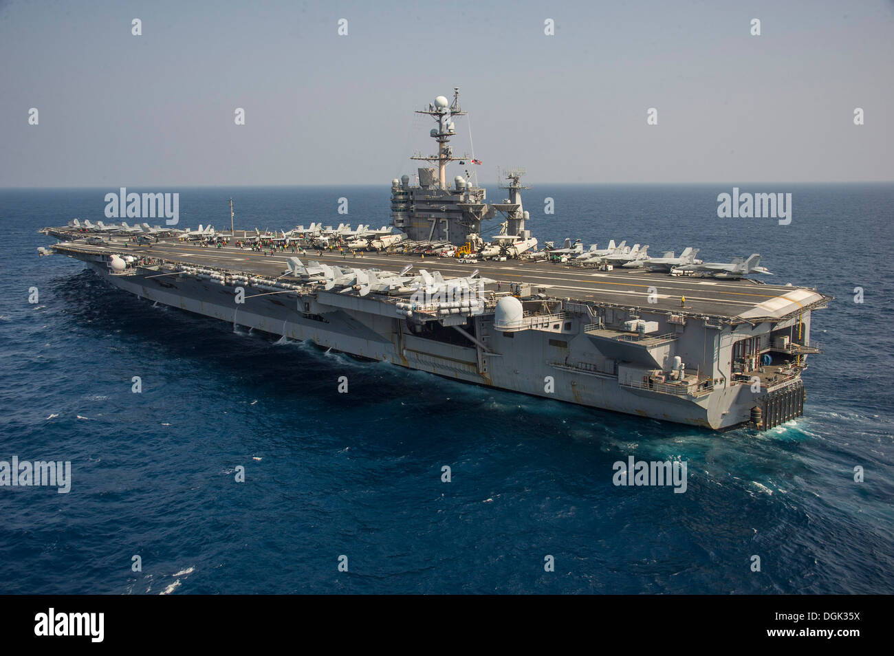 The aircraft carrier USS George Washington (CVN 73) patrols the waters to the west of the Korean peninsula. George Washington and its embarked air wing, Carrier Air Wing (CVW) 5, provide a combat-ready force that protects and defends the collective mariti Stock Photo