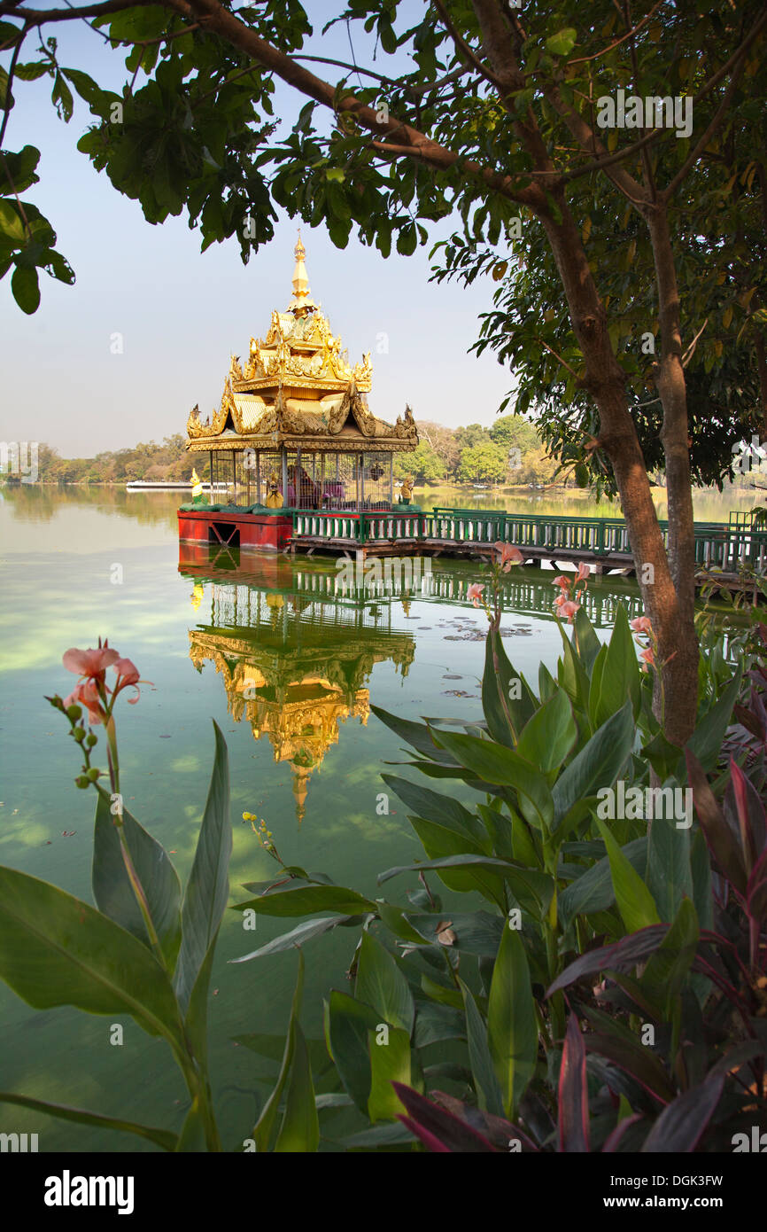 A shady pavilion with crooked spire on Kandawgyi Lake in Yangon in Myanmar. Stock Photo