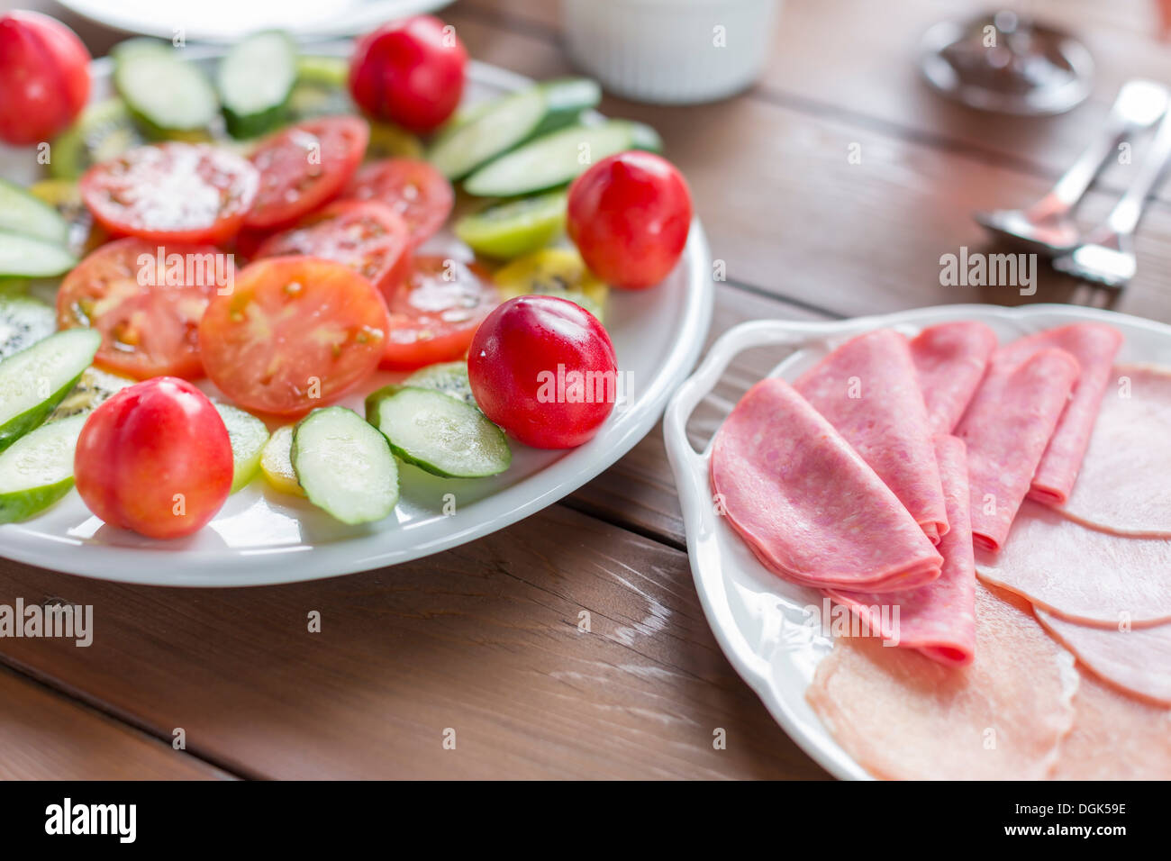 Variety of ham and cut vegetables Stock Photo Alamy