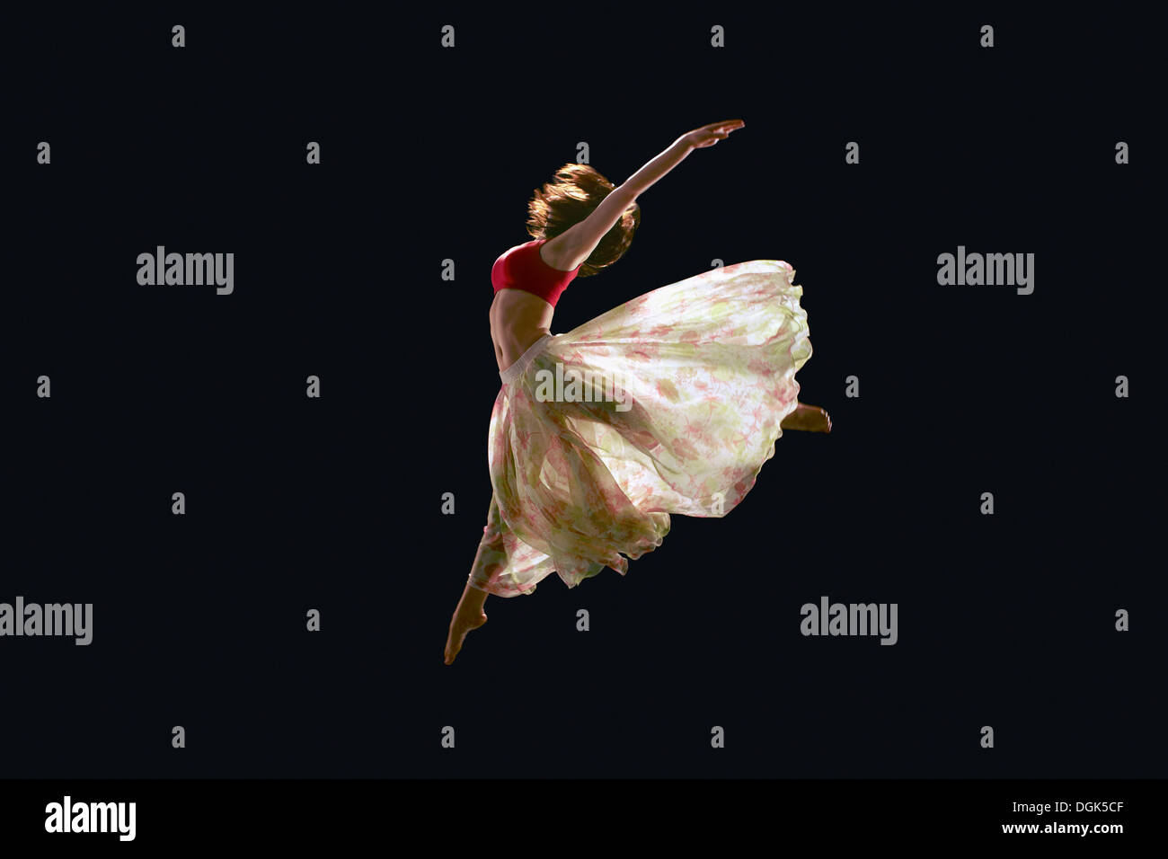 Dancer in midair wearing tutu Stock Photo