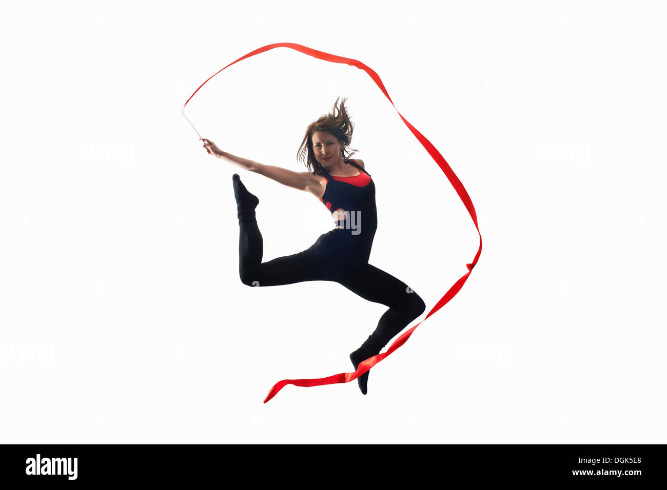 Dancer with ribbon on white background Stock Photo