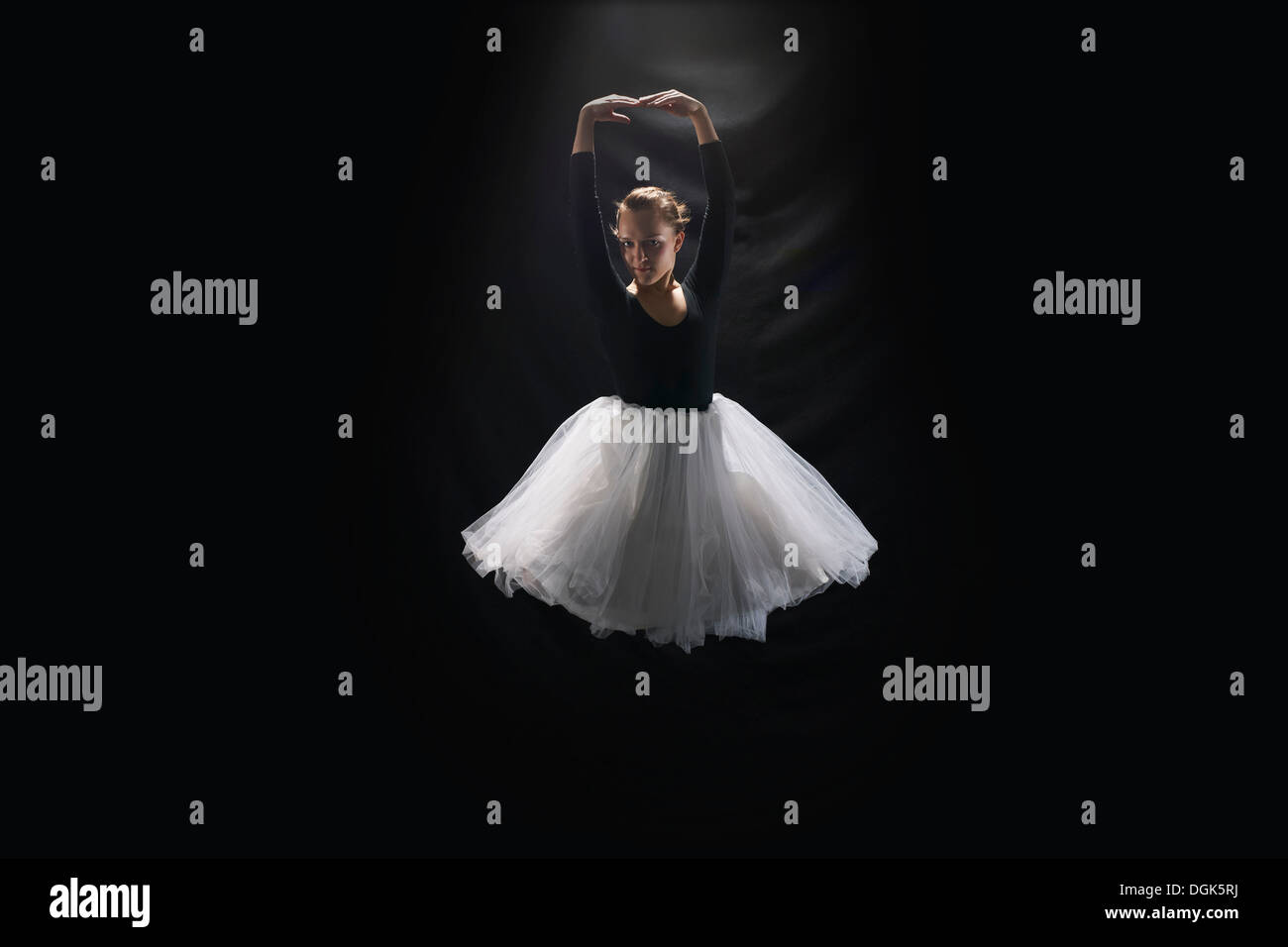 Ballerina on black background Stock Photo