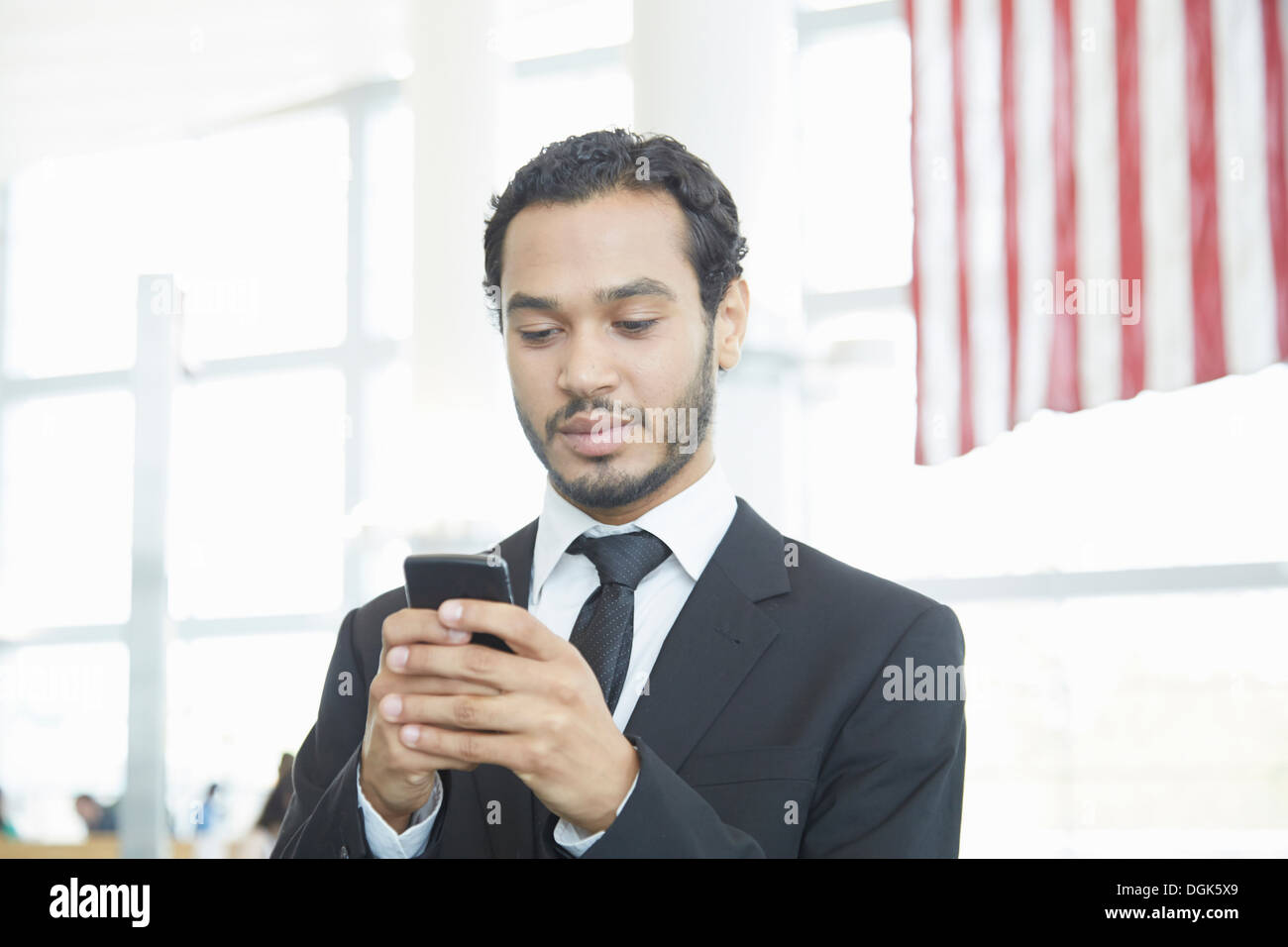 Businessman using smartphone Stock Photo