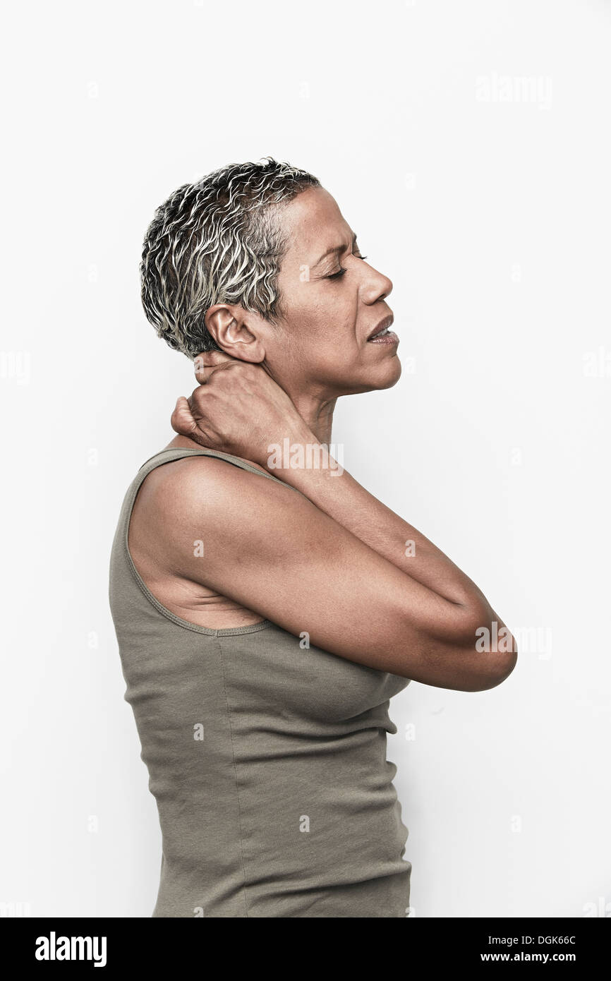 Senior woman with neck pain Stock Photo