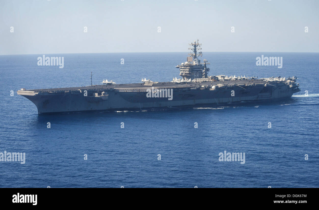 The aircraft carrier USS Nimitz (CVN 68) is underway in the U.S. 5th Fleet area of responsibility. The Nimitz Carrier Strike Group is deployed to the U.S. 5th Fleet area of responsibility conducting maritime security operations and theater security cooper Stock Photo
