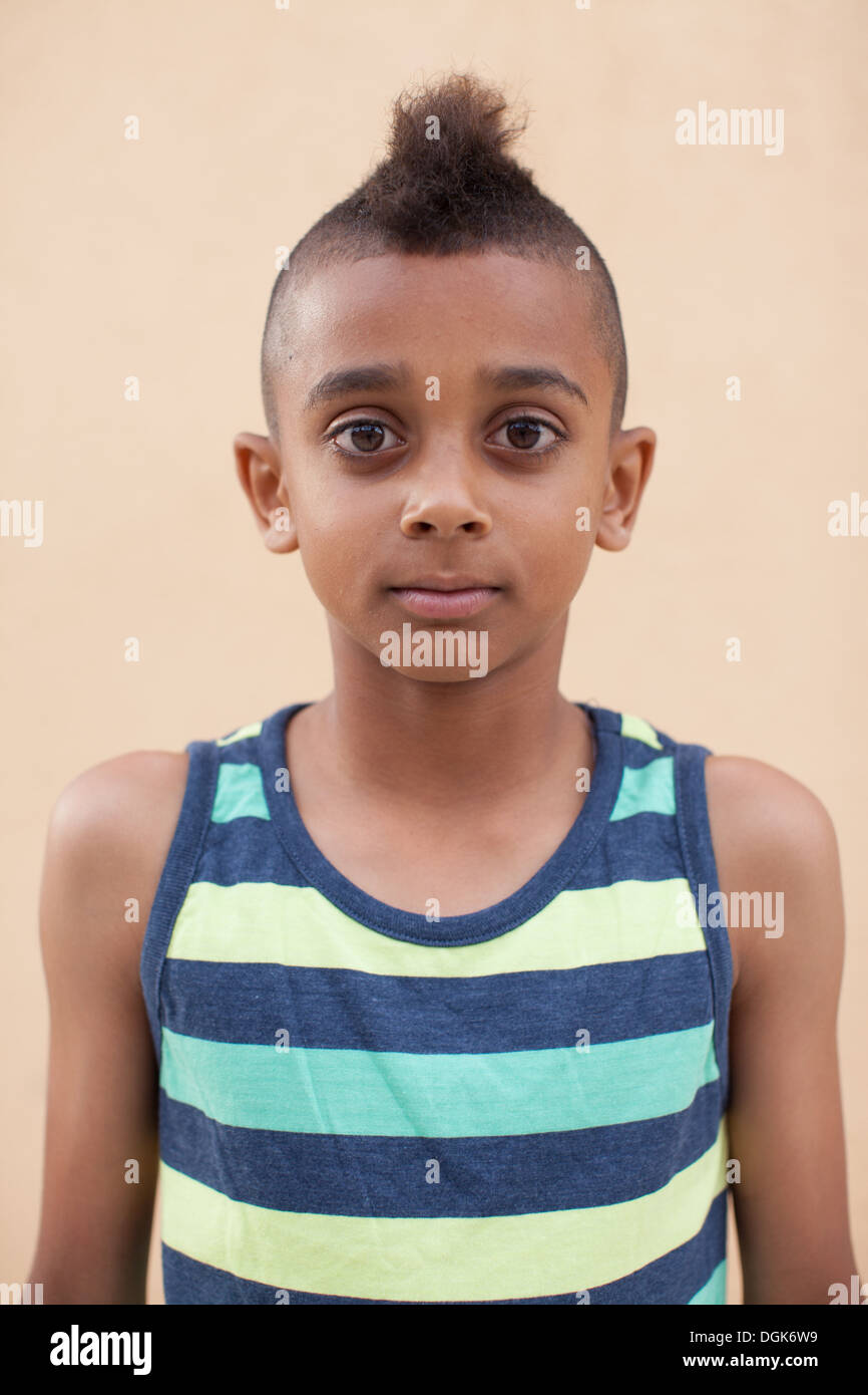 Portrait Of Boy With Mohawk Hairstyle Front View Stock Photo