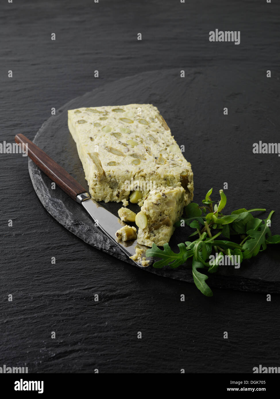 Still life with slice of asparagus, pea and edamame pate Stock Photo