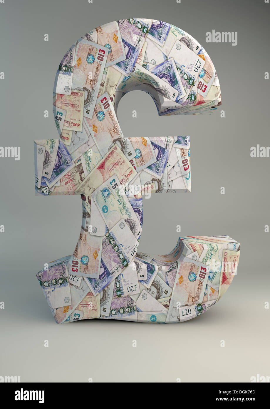 Model of pound sign wallpapered with British bank notes Stock Photo