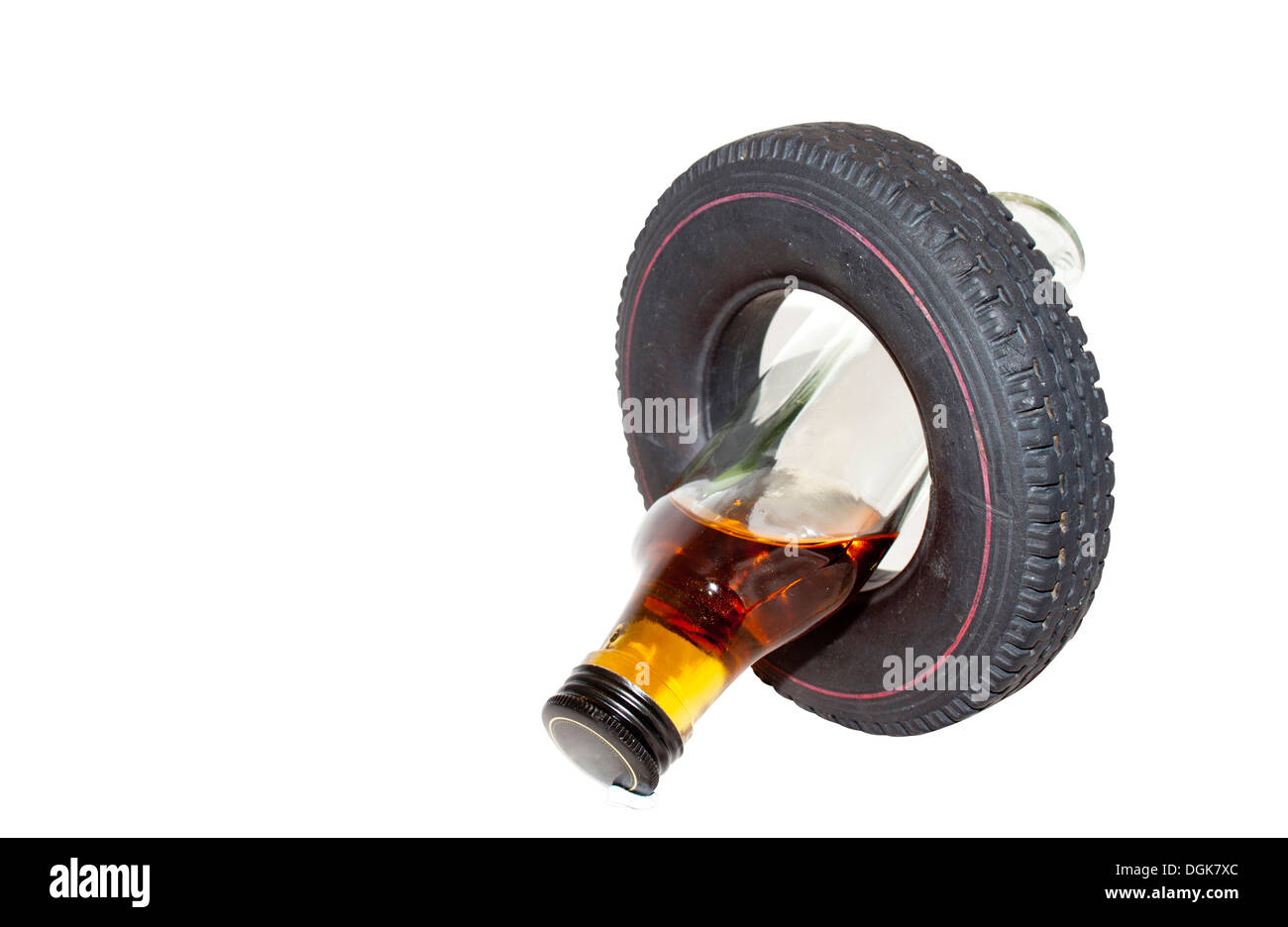 Isolated no drinking and driving concept with vertical crossed alcohol bottle and tyre Stock Photo