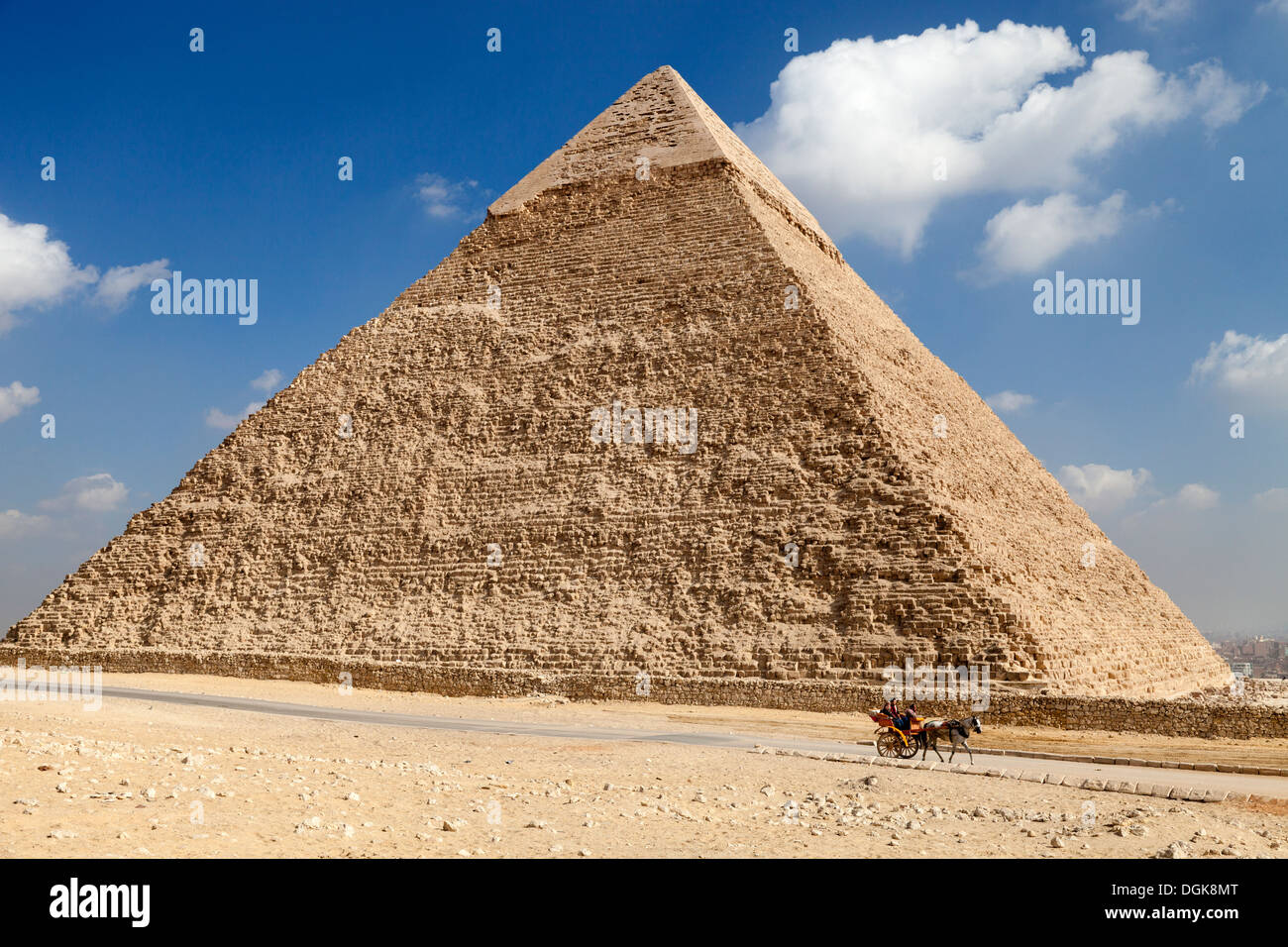 A horse and trap passes the Khafre Pyramid in Giza. Stock Photo