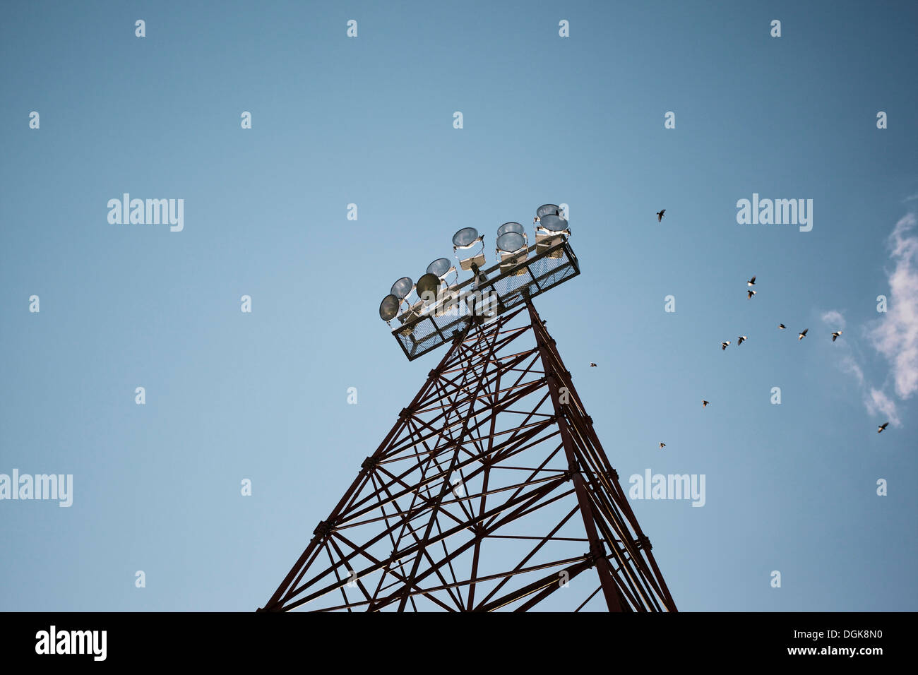 Floodlight tower from low angle view Stock Photo