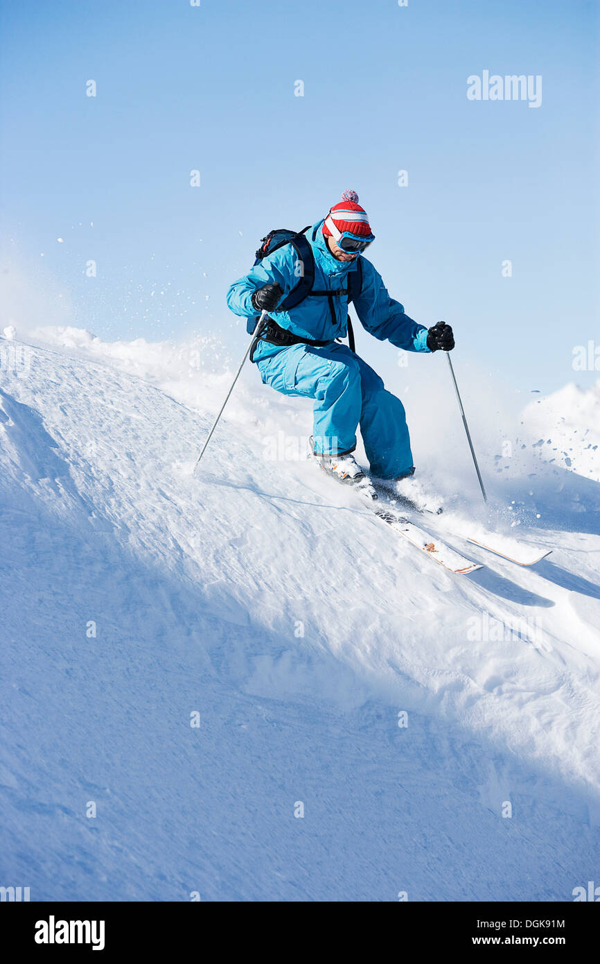 Male skiing downhill at speed Stock Photo Alamy