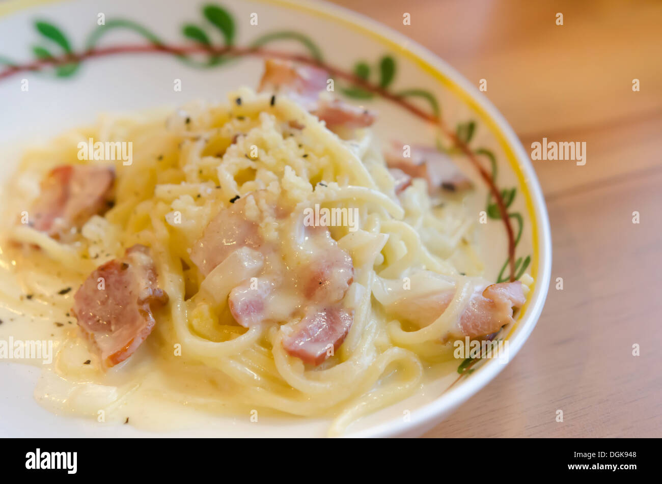 Spaghetti Carbonara with bacon and cheese on dish Stock Photo