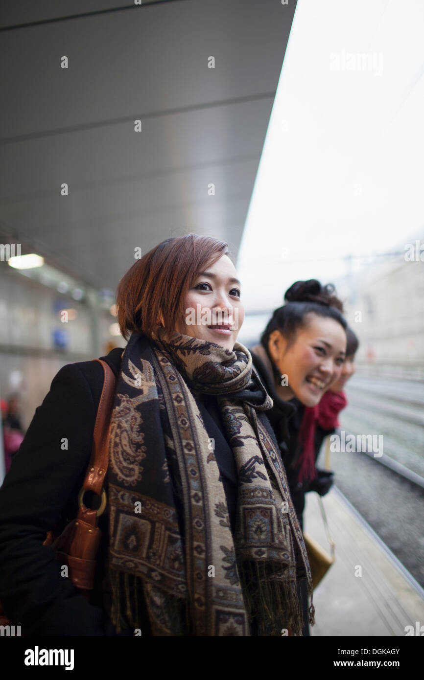 Young women waiting for train Stock Photo