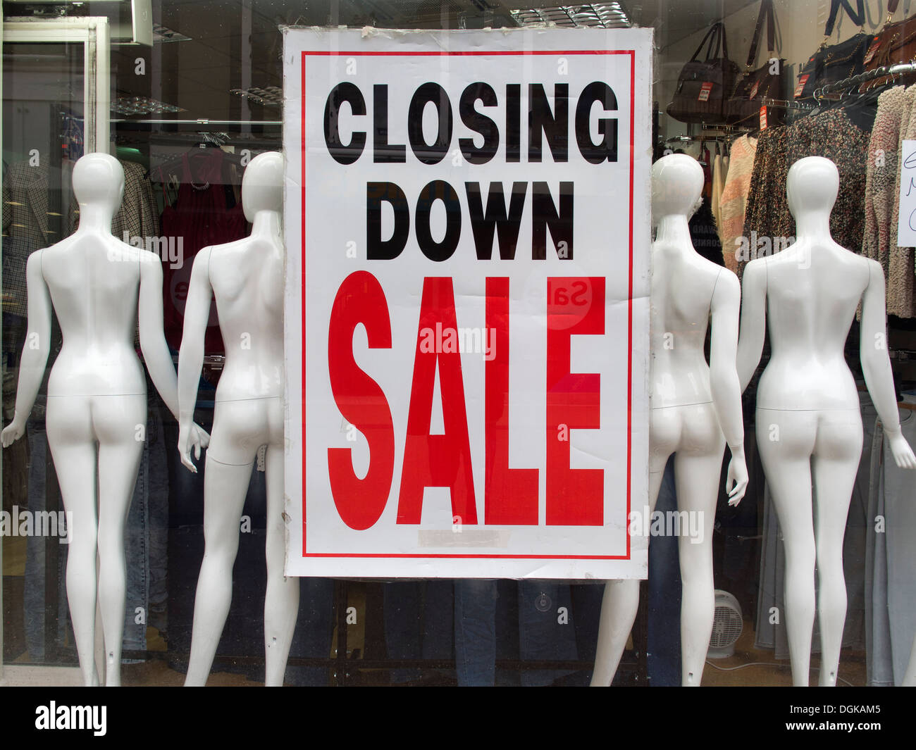 A closing down sale sign in a shop window in Oxford High Street. Stock Photo