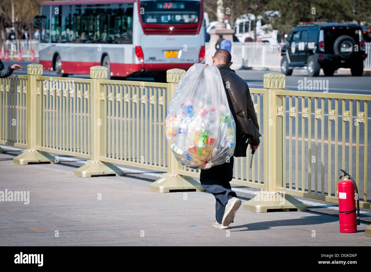 Man walking plastic carry bag hires stock photography and images Alamy