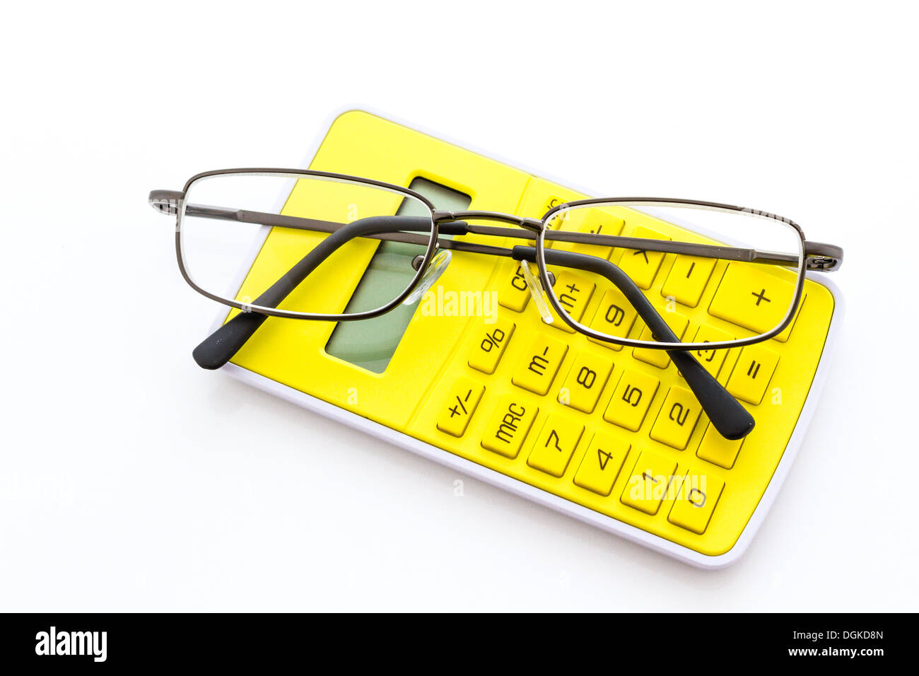 Simple yellow calculator with reading glasses on a white background