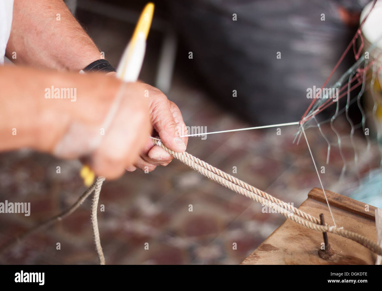 Weaving fishing net hires stock photography and images Alamy