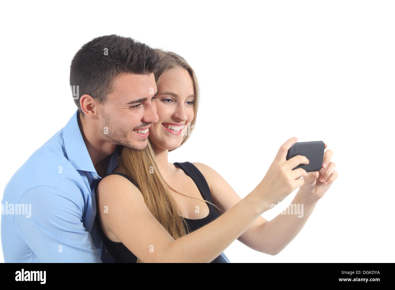 Couple watching social media on the smart phone isolated on a white background Stock Photo