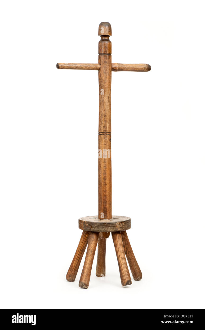 Antique wooden washing dolly, used to stir the washing in a wooden or zinc washing tub before we had washing machines. Stock Photo