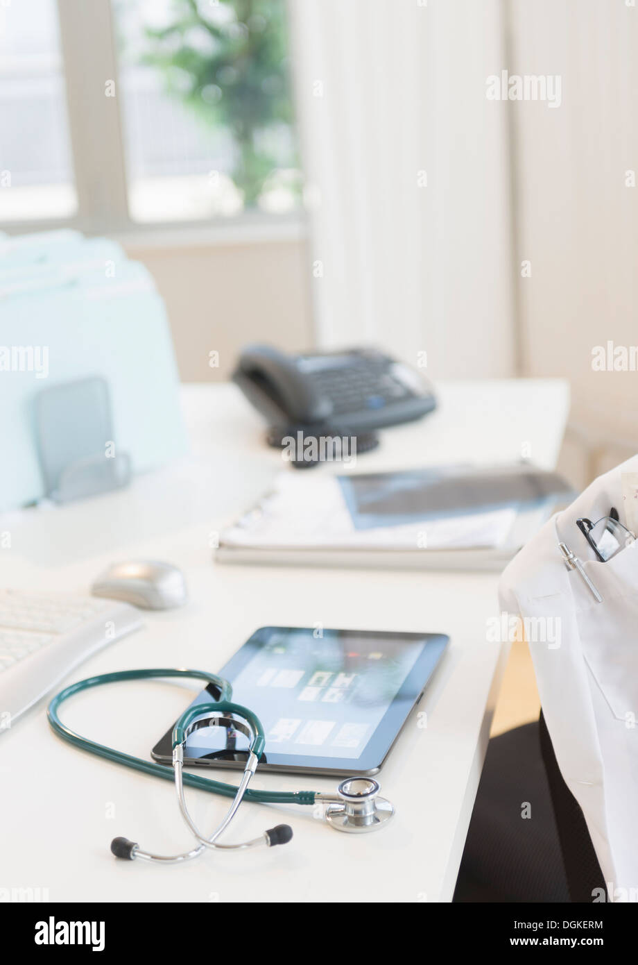 Tablet pc in doctor's office Stock Photo