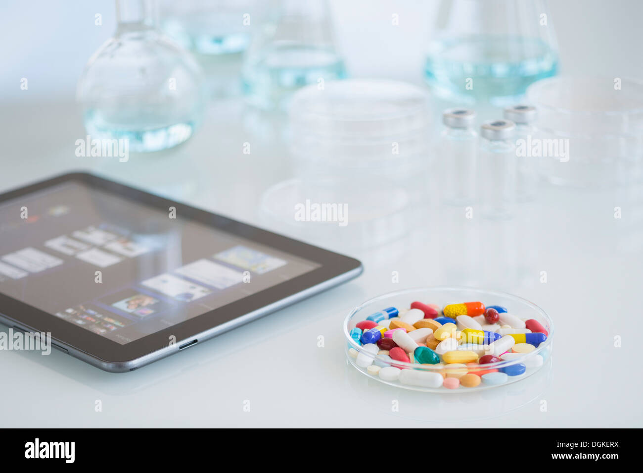 Studio shot of tablet pc and colorful pills Stock Photo