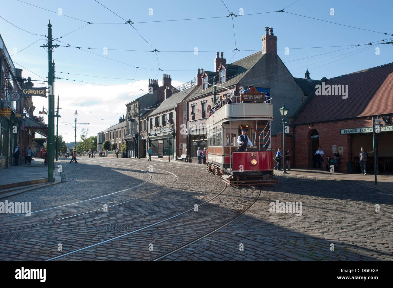 Vintage tram with passengers in open air museum. Stock Photo
