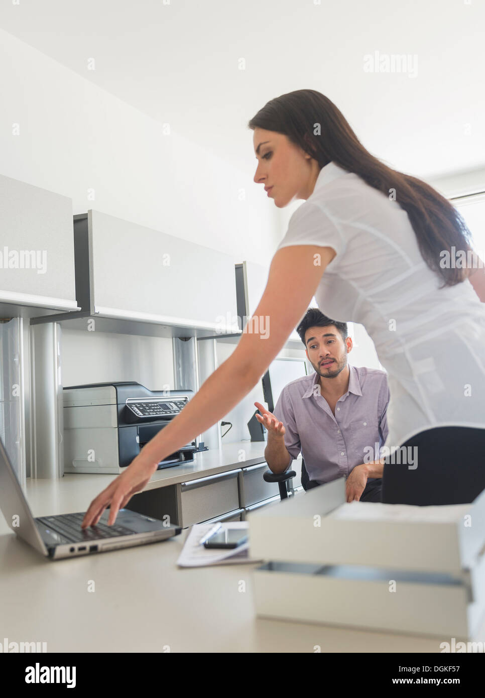 Laptop office worker hi-res stock photography and images - Alamy