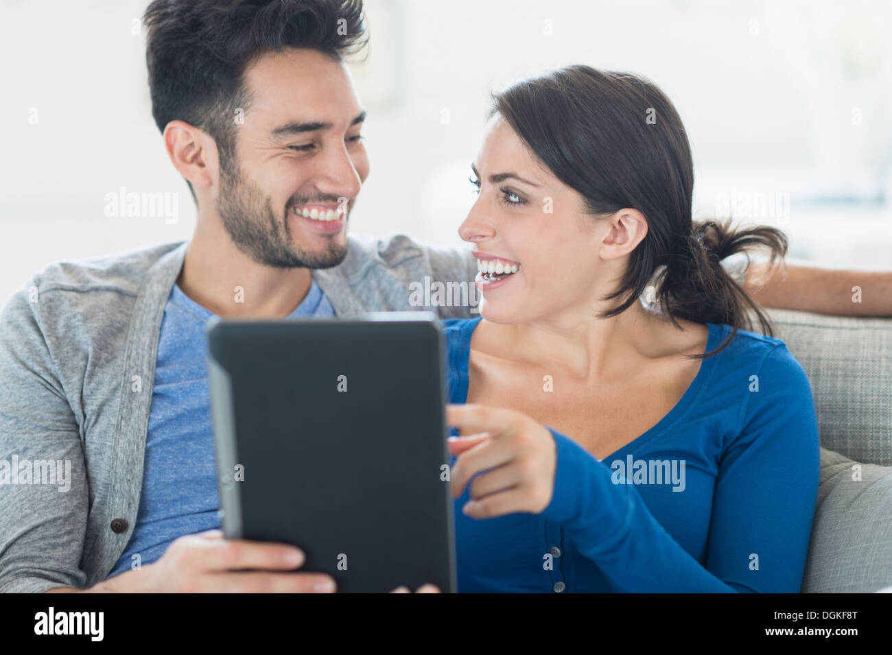 Couple using digital tablet Stock Photo