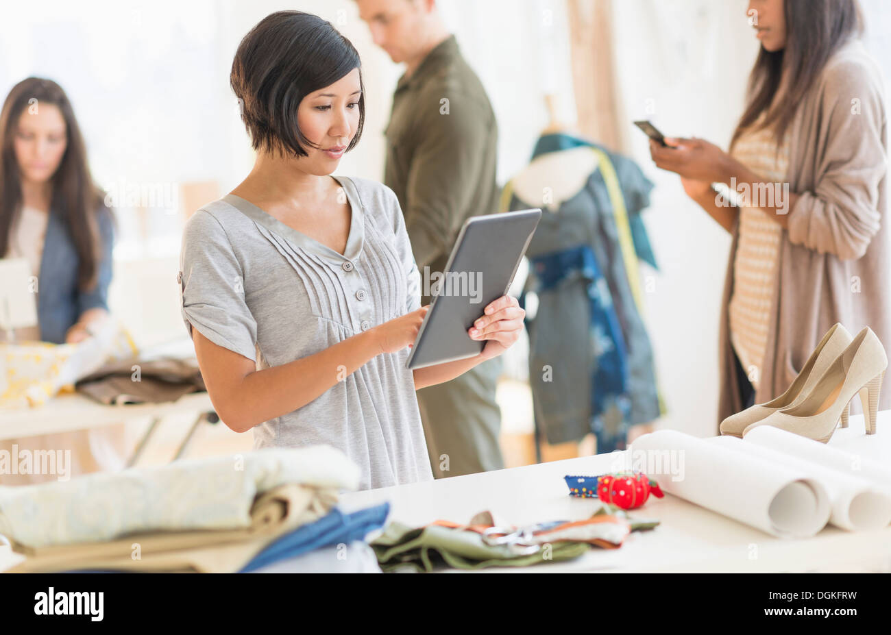 Young fashion designers working in studio Stock Photo