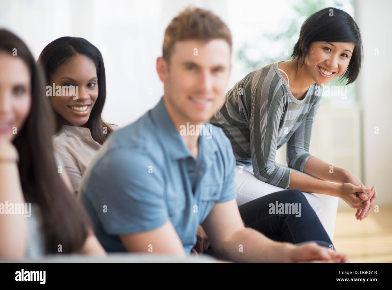 Group of women sitting on sofa hi-res stock photography and images - Alamy
