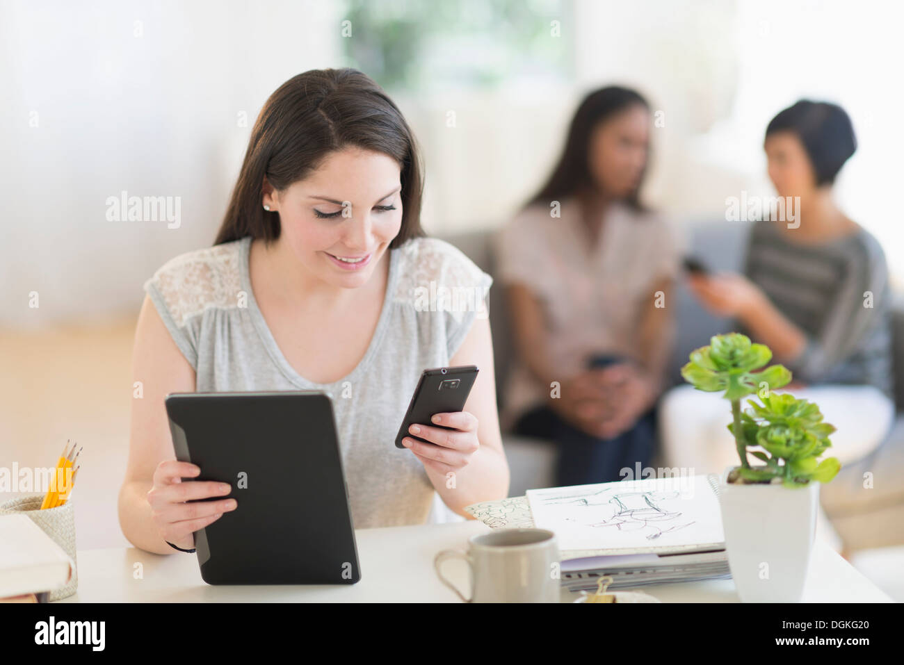 African woman sitting using mobile hi-res stock photography and images ...