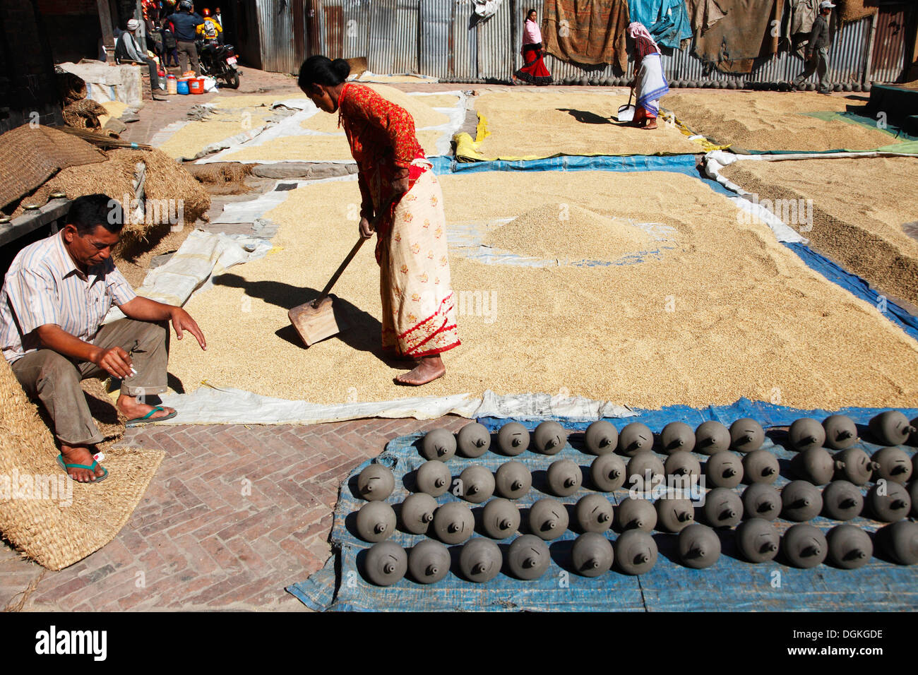 Women sifting wheat in Bhaktapur Stock Photo Alamy