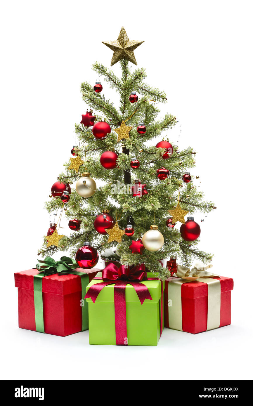 Decorated Christmas tree and gifts on white background Stock Photo