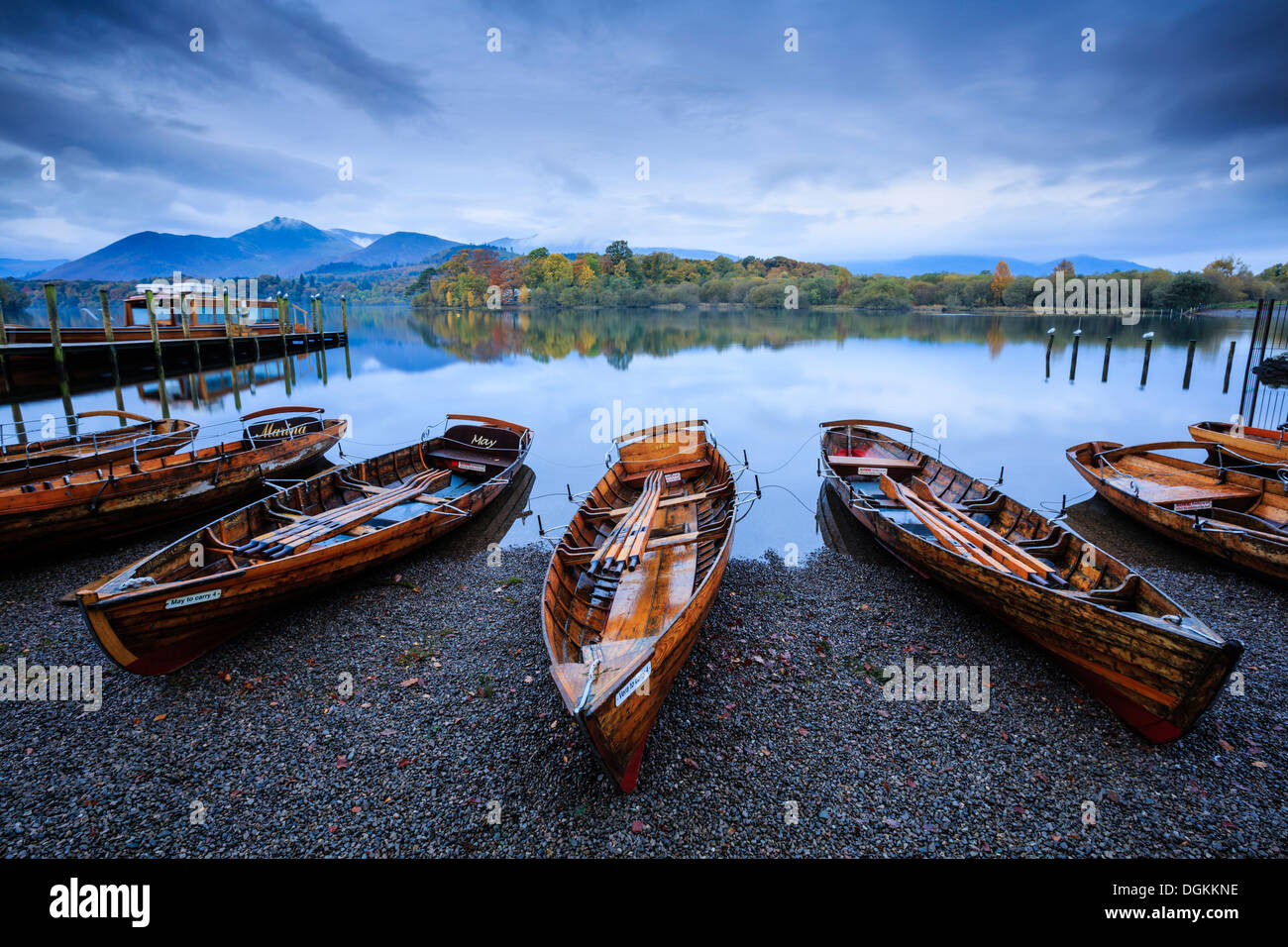 Rowing boats on the shore of Derwent Water near Keswick. Stock Photo