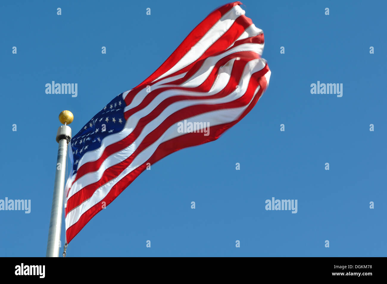 American Flag Waving in the Wind Stock Photo