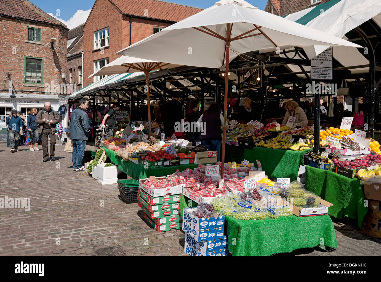 Fresh fruit and vegetables for sale at an outdoor market stall. Stock Photo